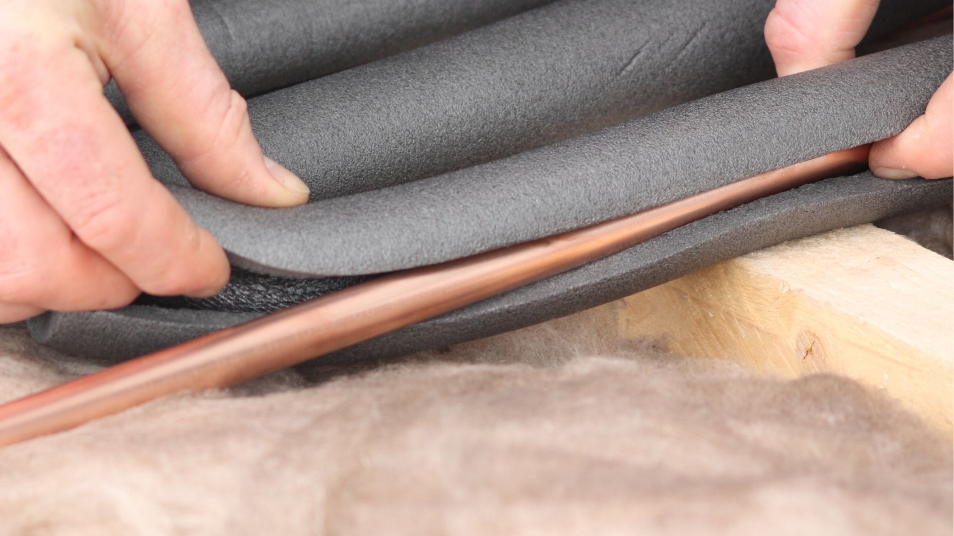 copper pipe being covered with unslit insulation