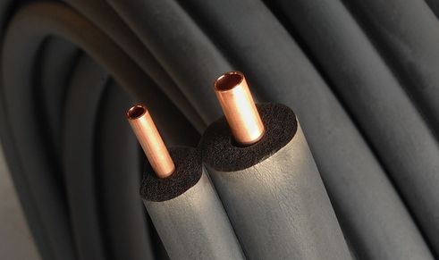 copper tube coil in black insulation