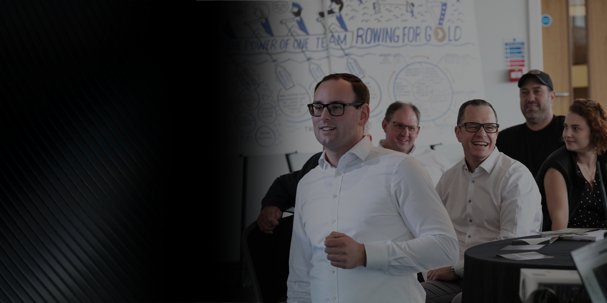 man in white shite presenting passionately