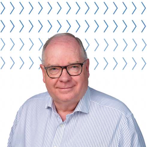 graham reiner wearing glasses and blue and white striped shirt.